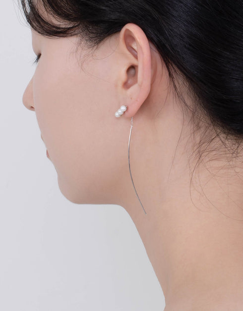 优雅的珍珠吊式耳环:极简主义魅力的交响曲