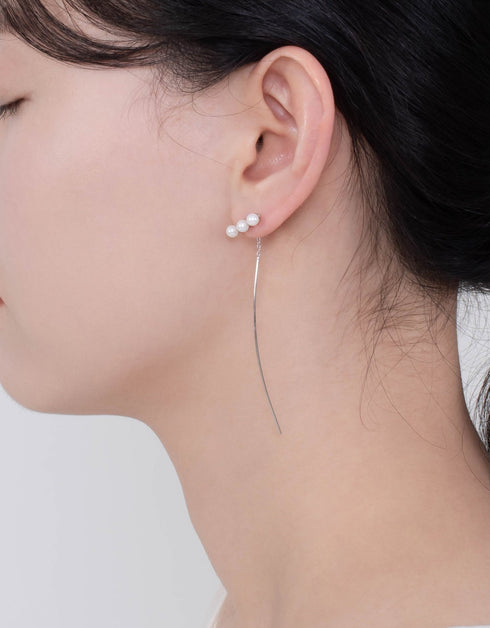 优雅的珍珠吊式耳环:极简主义魅力的交响曲