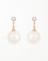 A Symphony of Elegance: Rose Gold-Plated Pearl Drop Earrings