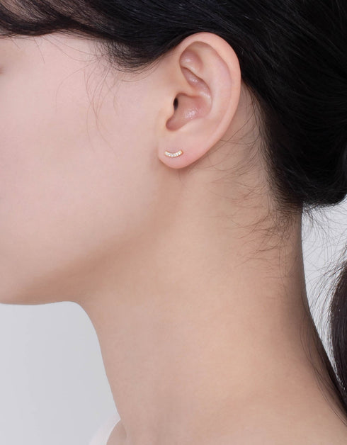 Elegant Curve: Sterling Silver and Cubic Zirconia Stud Earrings