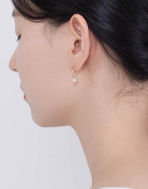 Lustrous Pearl & CZ Knot Stud Earrings - Elegant design