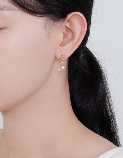 Lustrous Pearl & CZ Knot Stud Earrings - Elegant design