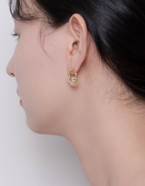 Swirling Sparkle Studs with Baguette CZ, Asymmetrical design