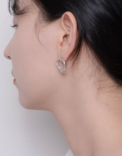 Swirling Sparkle Studs with Baguette CZ, Asymmetrical design