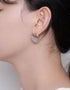 Swirling Sparkle Studs with Baguette CZ, Asymmetrical design