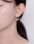 Swirling Sparkle Studs with Baguette CZ, Asymmetrical design